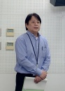担当